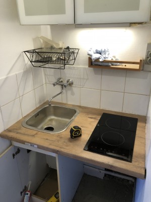 Photo de galerie - Pose d’une kitchenette dans un studio