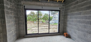 Photo de galerie - Installation d'une baie vitre de 3m 3rail 3 vantaux 