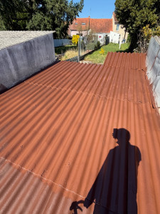 Photo de galerie - Renovation de fibrociment avec une resine de peinture 