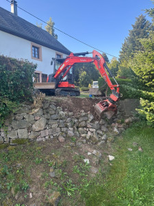 Photo de galerie - Démolition et reconstruction d’un mur en pierre 