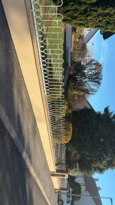 Photo de galerie - Mur et barrière repeint en deux couches