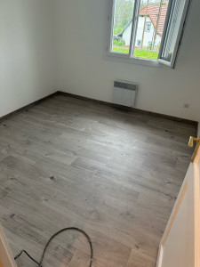 Photo de galerie - Pose de sol stratifié 