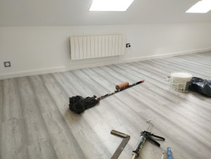 Photo de galerie - Pose de parquet plinthe 