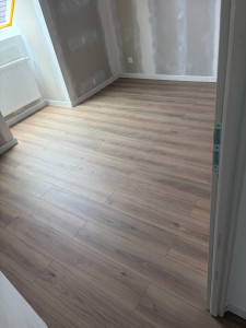 Photo de galerie - Pose de parquet dans une chambre 