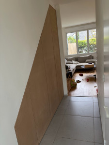 Photo de galerie - Création portes en MDF sous escalier 