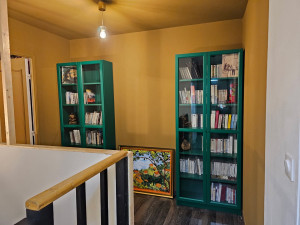 Photo de galerie - Réalisation complète d’une pièce bibliothèque 