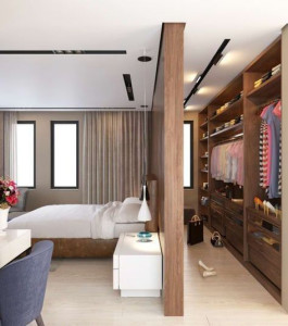 Photo de galerie - Réalisation d’un agencement intérieur sur mesure, avec création d’espaces de rangement et intégration de menuiseries parfaitement adaptées à la pièce. Un travail soigné qui permet d’optimiser les volumes tout en apportant une finition moderne, élégante.