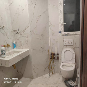 Photo de galerie - Travaux de revêtements mur d'une salle de bain 