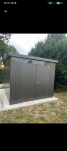 Photo de galerie - Installation d'un abri de jardin chez un particulier dans un temps rapide et résultat très satisfaisant ainsi que le client est très content concernant prix et qualité de travail.