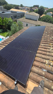 Photo de galerie - L'installation de panneaux photovoltaïques.