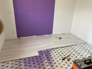 Photo de galerie - Pose d’un parquet stratifié et sa sous couche