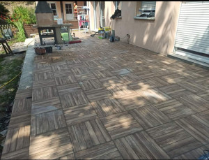 Photo de galerie - Pose d'un carrelage sur une terrasse 