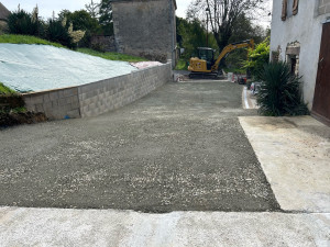 Photo de galerie - Réalisation d’un mur avec drainage Aménagement de cour  