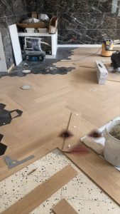 Photo de galerie - Pose parquet fondu carrelage 