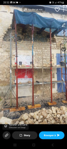 Photo de galerie - Pose de moellons suite à une chute d'une partie du mur en moellons sur une façade 