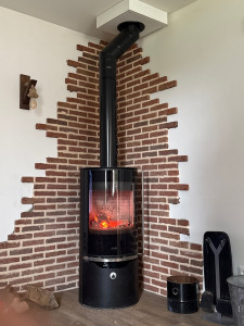 Photo de galerie - Pose de briquette et installation poêle 